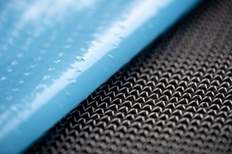 SAERfix sur tissu NCF en carbone